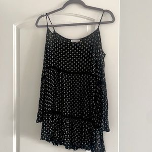 Cute flowy boho shirt! Arms are open. Perfect for a summer day.